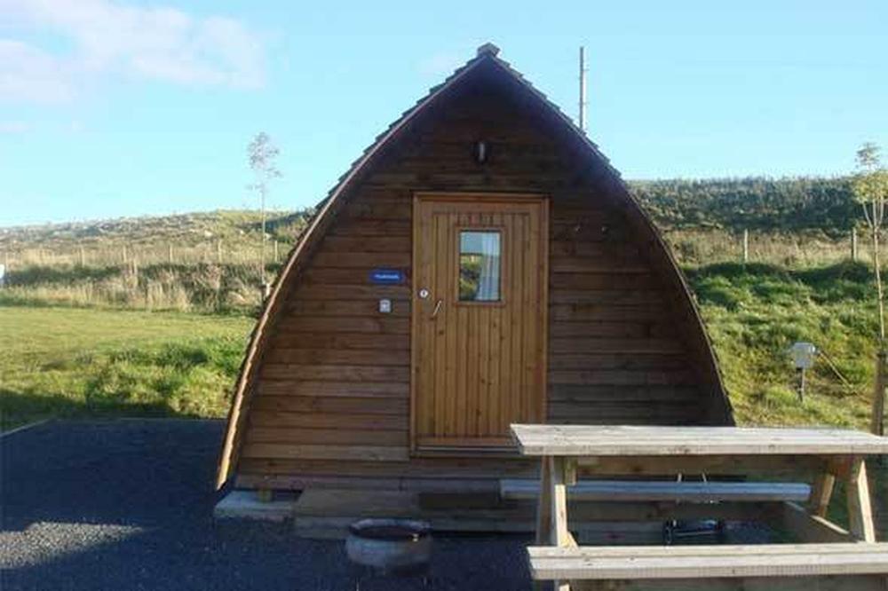 Dog-friendly Wigwam pod with a picnic bench at Wigwam Holidays Herding Hill Farm near Haltwhistle and Hadrian's Wall