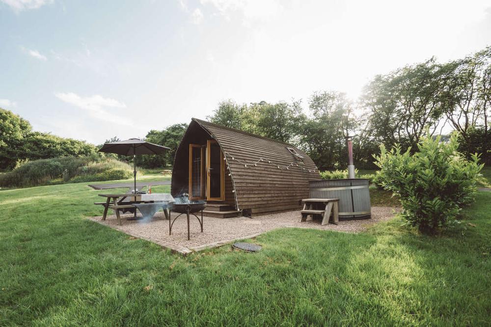 Glamping with a hot tub at Wigwam Holidays Brecon in the Bannau Brycheiniog